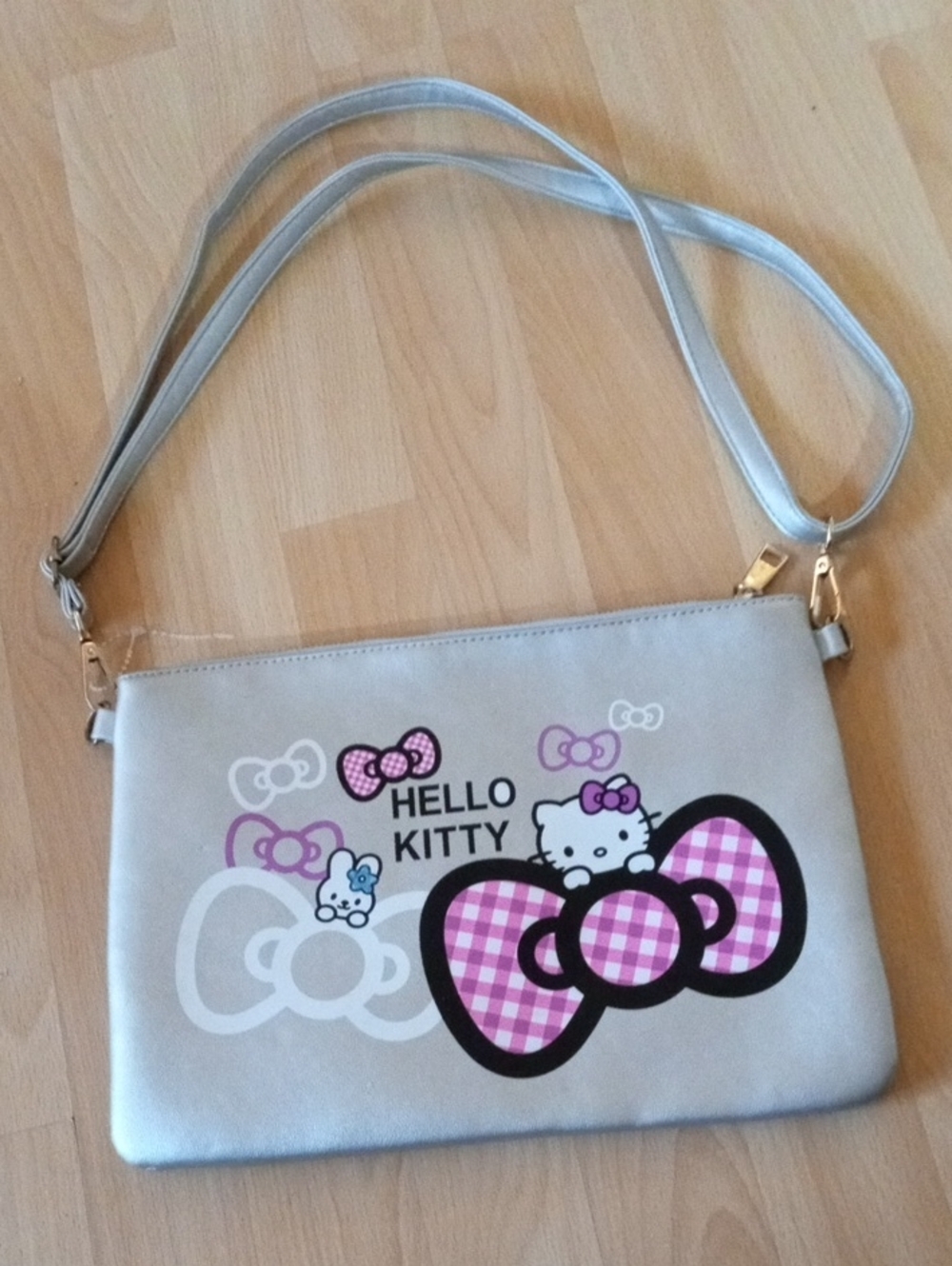 Hello Kitty Silver Crossbody Bag with Pink Bow Accents